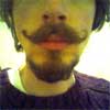 Photo of cherdt with vandyke-style facial hair
